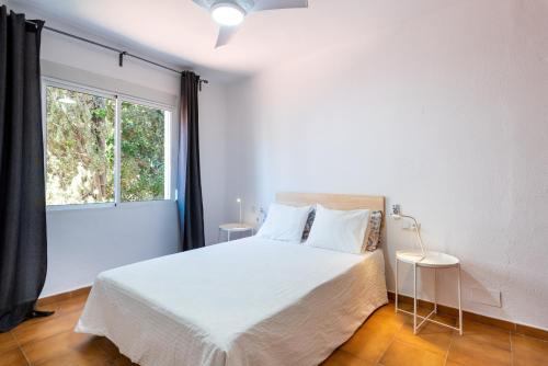 Posteľ alebo postele v izbe v ubytovaní Apartamento Residencial Limonar