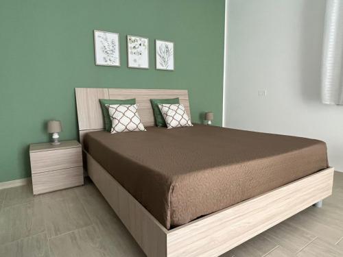 Ένα ή περισσότερα κρεβάτια σε δωμάτιο στο B&B Alessia