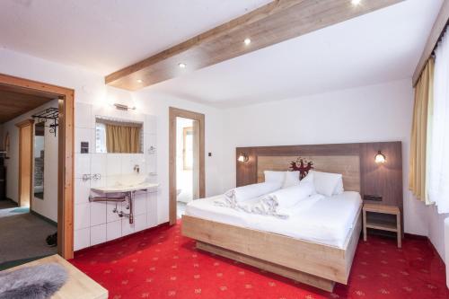 Postel nebo postele na pokoji v ubytování Haus Hrabovsky