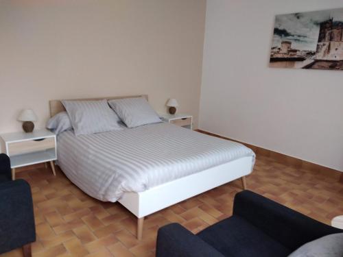 Postel nebo postele na pokoji v ubytování Appartement à Rochefort