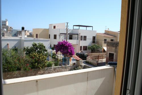 a view of a city from a window at Angolo del Mare - Case Libeccio e Blu Marino in Favignana