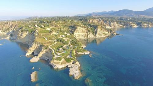 an aerial view of a rocky island in the water at Villa Afroditi, Spartia, Kefalonia in Kefallonia
