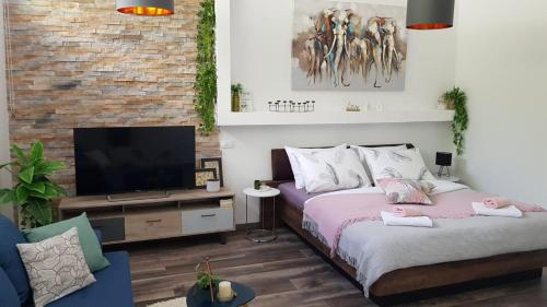 Guest House Adriatic tesisinde bir odada yatak veya yataklar