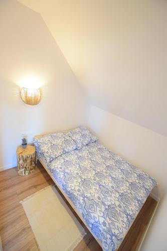 a mattress on the floor in a room at Johnny House 2 in Suwałki