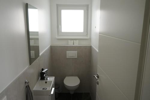 A bathroom at DM Apartment
