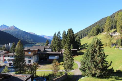 an aerial view of a house in the mountains at Alberti 5 in Davos
