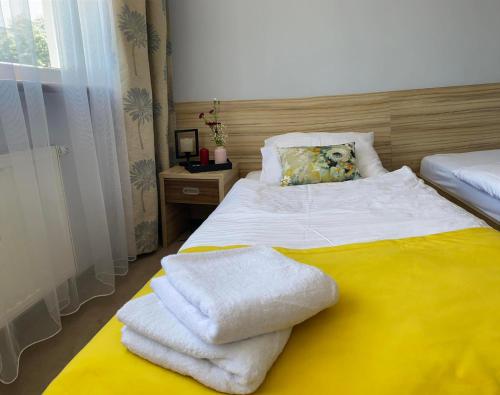 Ένα ή περισσότερα κρεβάτια σε δωμάτιο στο Hotel Alpex View