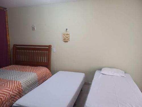 Cama ou camas em um quarto em Pousada Terrissol