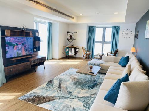 TV a/nebo společenská místnost v ubytování Marina Dubai Hostel