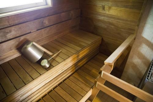 an overhead view of a sauna with a toilet paper dispenser at Hotelli-Ravintola Gasthaus Lohja in Lohja