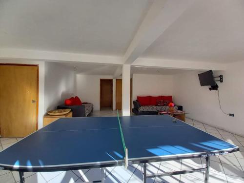 Stolní tenis v ubytování Hostal Pata de Perro nebo okolí
