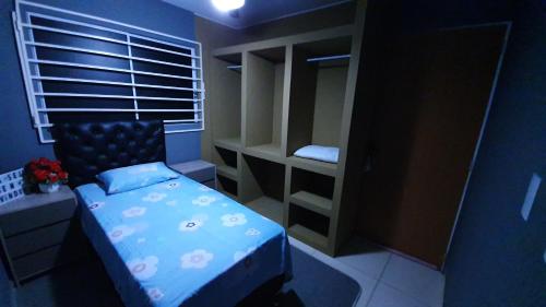 a small bedroom with a bed and a bunk room at Bedroom Airport in Maceió