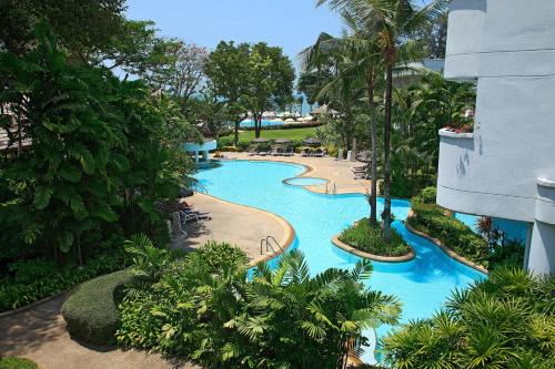 an overhead view of a pool at a resort at Novotel Rayong Rim Pae Resort in Klaeng