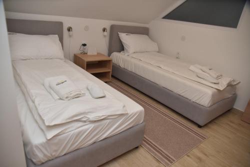 Postel nebo postele na pokoji v ubytování Vila Lux Nedeljkovic Gornja Trepca