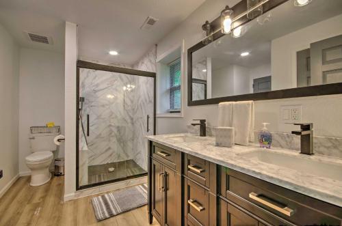 a bathroom with a large sink and a shower at Waterfront Escape Ozarks Home and Guest House! in Gravois Mills