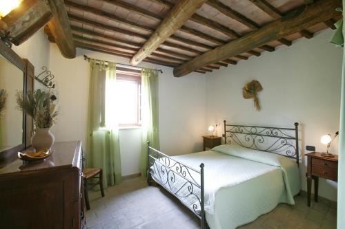 A bed or beds in a room at Casina Centeno