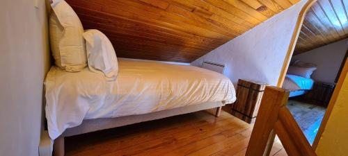 Postel nebo postele na pokoji v ubytování Hotel l'Escapade