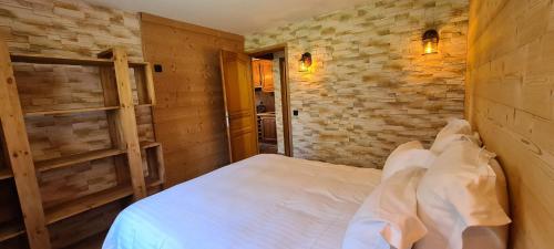 Postel nebo postele na pokoji v ubytování Hotel l'Escapade