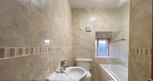 Ванна кімната в Dunbar Serviced Apartment