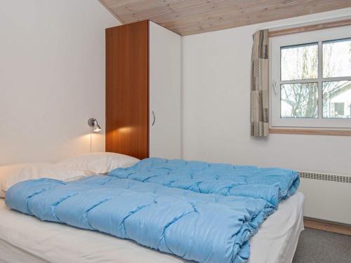 Postel nebo postele na pokoji v ubytování 6 person holiday home in Hemmet-By Traum