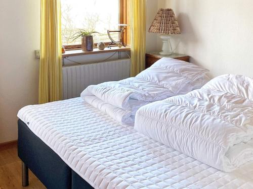 Postel nebo postele na pokoji v ubytování Holiday home Glesborg CXV