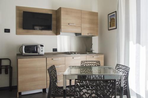 Η κουζίνα ή μικρή κουζίνα στο Ponticello Apartments