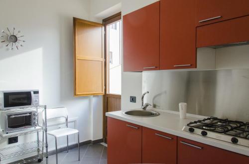 Η κουζίνα ή μικρή κουζίνα στο Ponticello Apartments