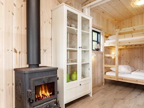 Un pat sau paturi într-o cameră la 4 person holiday home in Bogense-By Traum