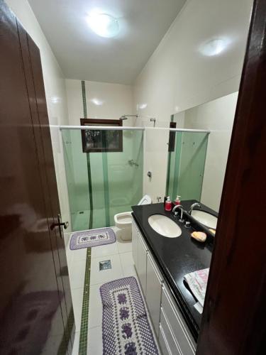 Ванная комната в Chácara de Luxo em Anápolis