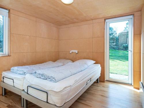 Postel nebo postele na pokoji v ubytování Holiday home Løgstør XXIII