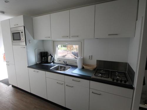Good chalet with dishwasher, surrounded by forest – Photos 5