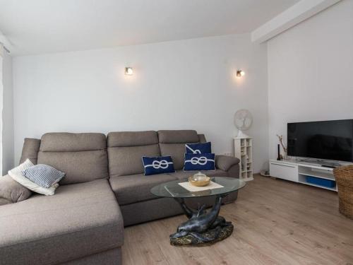 TV a/nebo společenská místnost v ubytování Podlug Family Apartment