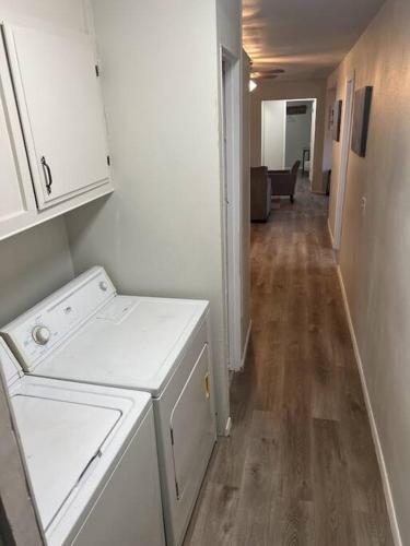 a kitchen with a washer and dryer in a room at Forest Cabin 7 Seventh Heaven in Payson