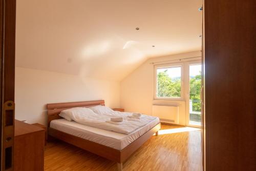 Katil atau katil-katil dalam bilik di Villa Mela