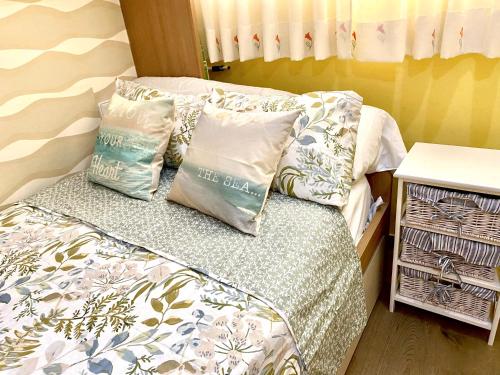 A bed or beds in a room at Sunset chill out