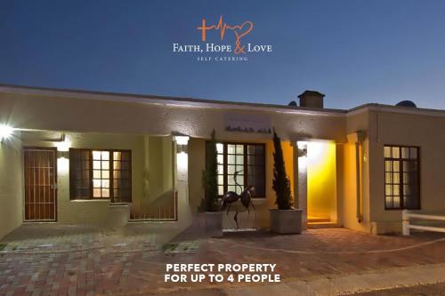 a house with the words perfect property for up to a people at Faith, Hope & Love Self Catering in Port Elizabeth