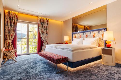 Postel nebo postele na pokoji v ubytování Hotel Schloss Seefels