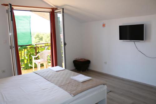 Postel nebo postele na pokoji v ubytování Olive apartments 3