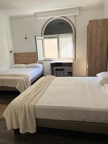 Katil atau katil-katil dalam bilik di Hotel Lutetia