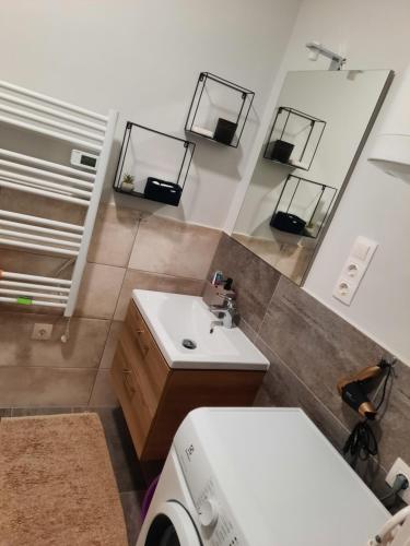 Ένα μπάνιο στο Lezser apartman