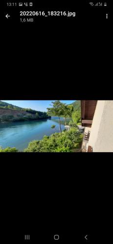 a view of a river from a building at Apartman na Drini in Foča