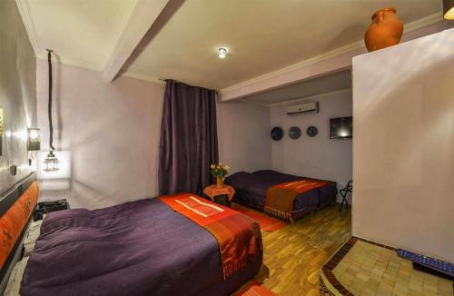 Postel nebo postele na pokoji v ubytování Hotel Islane