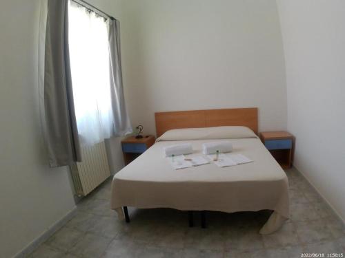 Posteľ alebo postele v izbe v ubytovaní Terrae Eremis: Ristorante, Bar, B&B