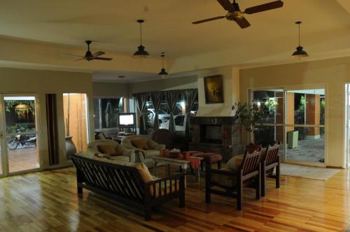 a living room with a couch and chairs at Hotel Monte Regina in Vera