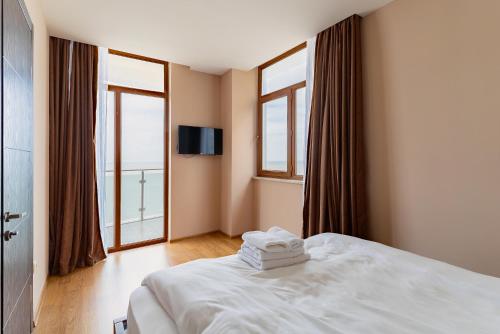 Cama o camas de una habitación en G-Point New Beach
