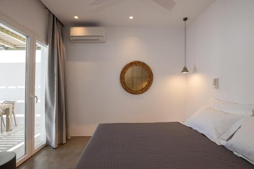 Ένα ή περισσότερα κρεβάτια σε δωμάτιο στο White Holidays Project