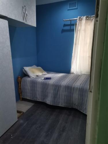 Ένα ή περισσότερα κρεβάτια σε δωμάτιο στο Simplyblu