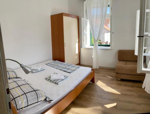 Posteľ alebo postele v izbe v ubytovaní Apartman Zablace