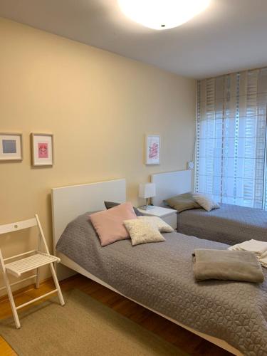 Ένα ή περισσότερα κρεβάτια σε δωμάτιο στο Alexa Nida Lighthouse Apartment