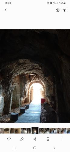 a picture of a tunnel in a cave at Le Logis des Templiers appartement climatisé in Régusse